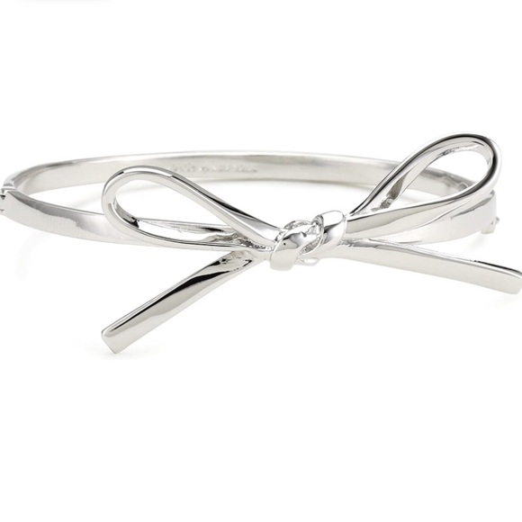 kate spade Jewelry - Kate Spade Skinny Mini Bow Bangle. Silver.
